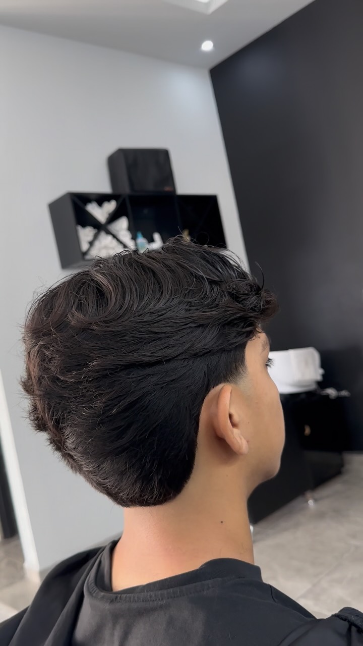 Barbero atendiendo en Punto La Pastora